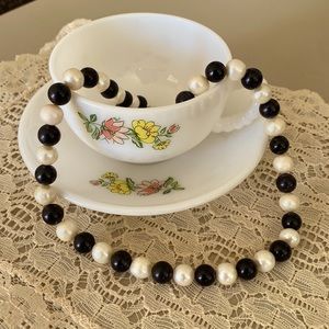 Black onyx and authentic white pearl necklace with ring clasp
